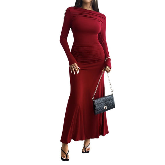 Autumn and winter European and American women's clothing temperament solid color hip hugging one neck dress