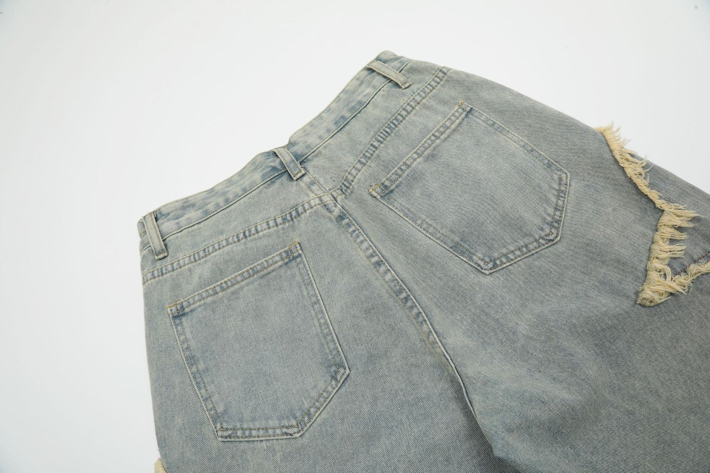 Sharpened And Washed Denim Shorts With Torn Holes